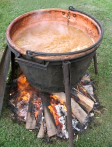 Apple butter boiling in an open kettle