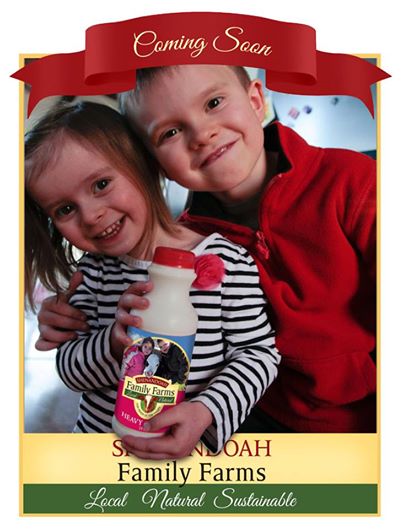 Colin and Chloe holding heavy cream carton with their image on the label