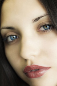 beautiful dark haired woman with blue eyes two
