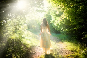 Fairy woman walking in the woods